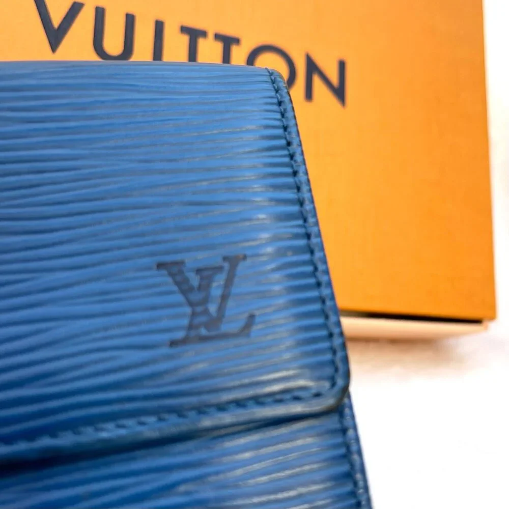 Auc Louis Vuitton blue Epi leather classic wallet w double button snap closure